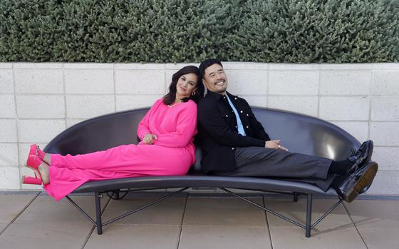 Melissa Fumero, left, and Randall Park, who play Blockbuster employees in the Netflix series “Blockbuster,” pose together for a portrait, Oct. 24 in Los Angeles.  