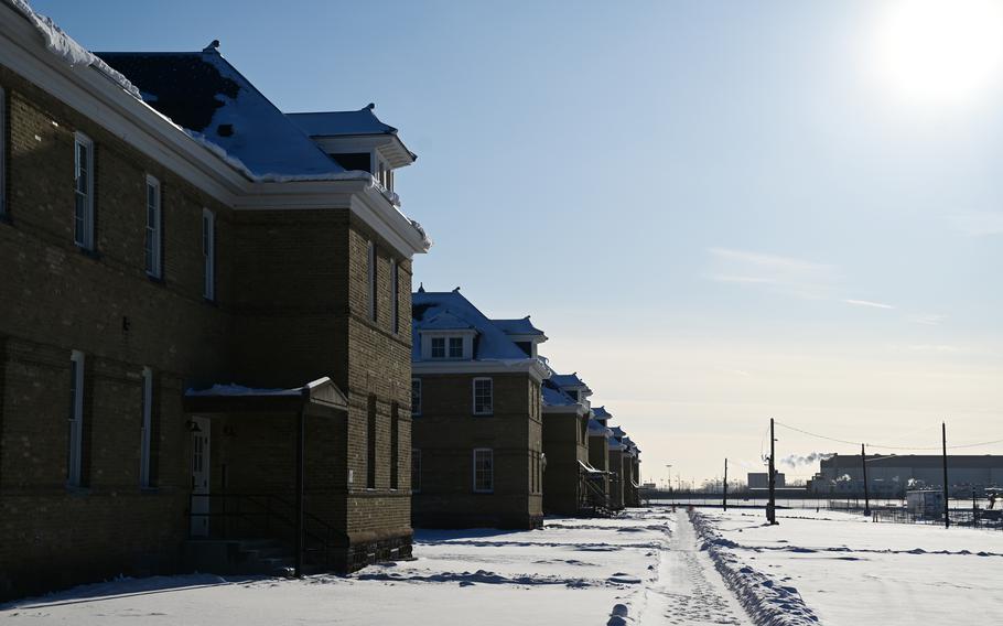 A row of former Army barracks are being refurbished into apartments at the Upper Post Flats development at Fort Snelling on Tuesday, Dec. 20, 2022. The development offers a variety of housing units built from the former military buildings of Fort Snelling, with preference given to active and retired military members, veterans, first responders and VA employees.