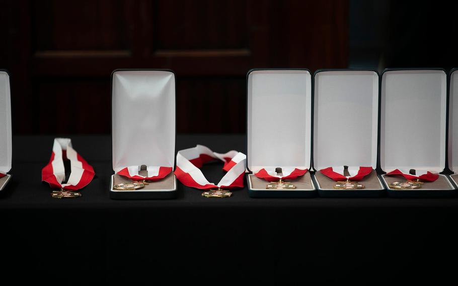 Medals wait for their recipients Friday at the induction ceremony for the Ohio Military Hall of Fame for Valor class of 2021.