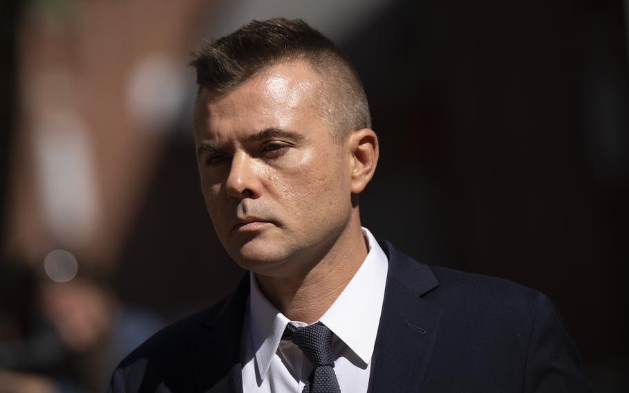 Russian analyst Igor Danchenko walks to the Albert V. Bryan U.S. Courthouse during a lunch break in his trial on Oct. 11, 2022, in Alexandria, Virginia. 