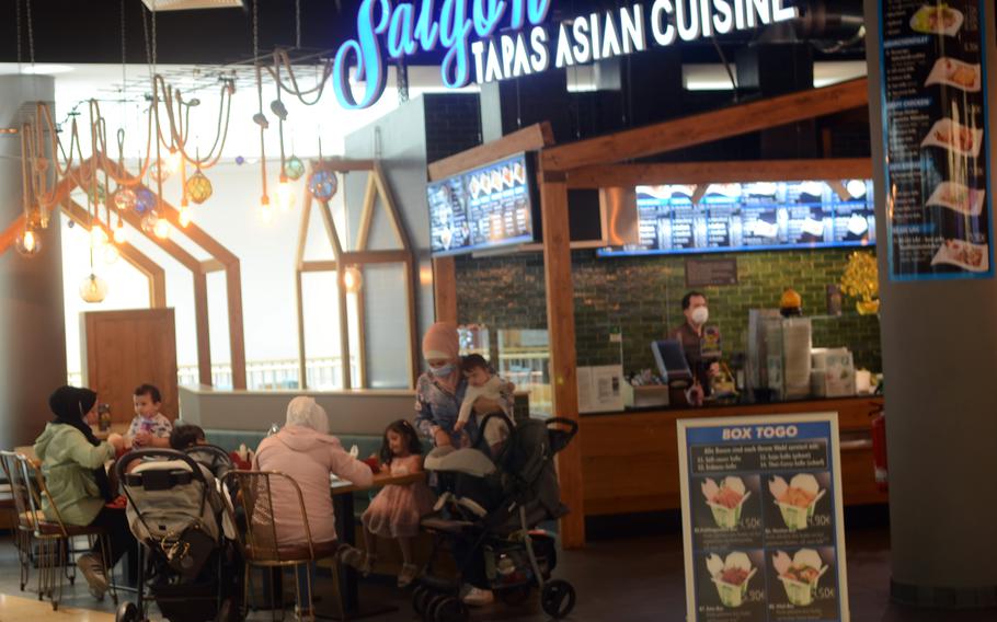 Customers enjoy a meal inside the LusienForum mall on June 10, 2021, in downtown Wiesbaden, Germany. Coronavirus restrictions continue to ease in the city, which is home to U.S. Army Europe and Africa headquarters. 