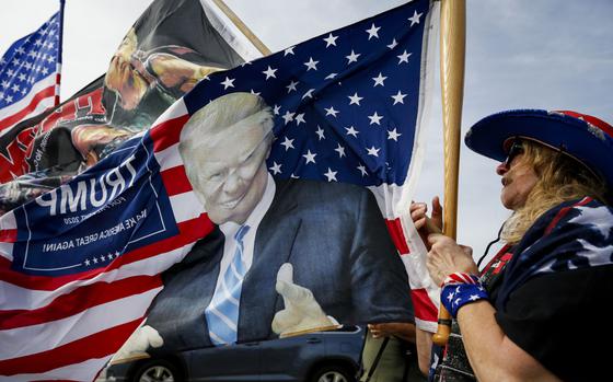 Supporters of former president Donald Trump outside Mar-A-Lago in Palm Beach, Fla., on Aug. 9, 2022. MUST CREDIT: Bloomberg photo by Eva Marie Uzcategui.