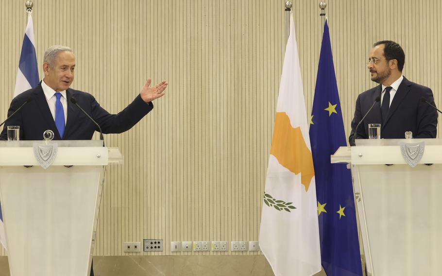 Cypriot president Nikos Christodoulides, right, and Israeli Prime Minister Benjamin Netanyahu talk to the media during a press conference after their meeting at the presidential palace in capital Nicosia, Cyprus, on Sunday, Sept. 3, 2023.