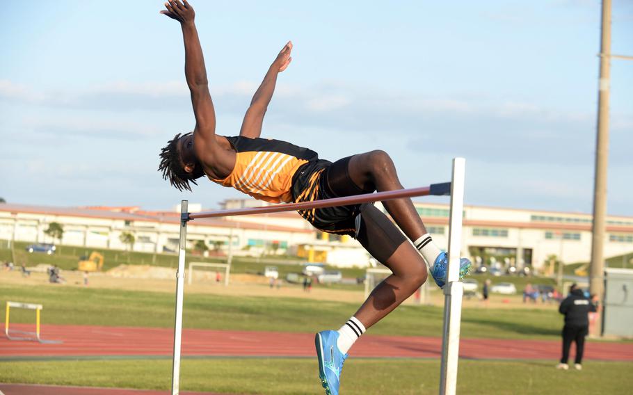 Kadena's Jayden Allen clears 5 feet, 5 inches to win the long jump Wednesday in Day 1 of a two-day DODEA-Okinawa track and field meet.