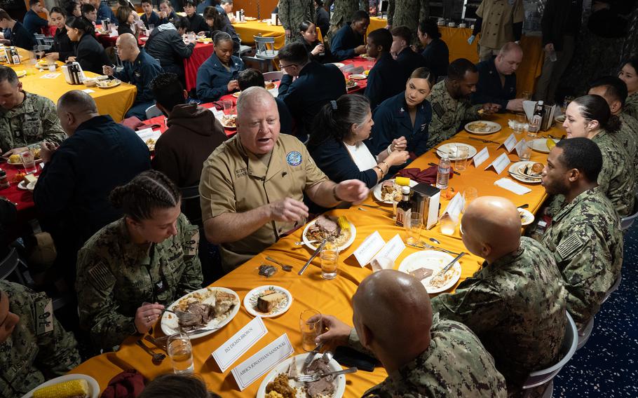 Master Chief Petty Officer of the Navy James Honea celebrates Thanksgiving with sailors aboard the USS Ronald Reagan at Yokosuka Naval Base, Japan, Thursday, Nov. 23, 2023.