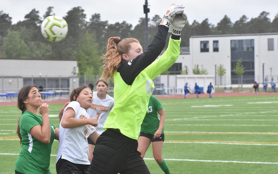 A corner kick from Alconbury's Sofia Politis glances off the hands of Spangdahlem goalkeeper Isabel Bodily. The Dragons' Eleni Politis was waiting and kicked it in for her third goal of the game in a 4-1 victory Tuesday, May 16, 2023, in the DODEA-Europe girls Division III championships at Ramstein Air Base, Germany.