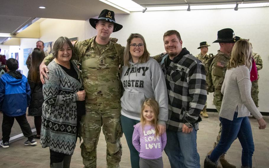 Master Sgt. Thomas Shirey is welcomed home by family and friends Jan. 13, 2024, at Eppley Airfield in Omaha, Neb. 