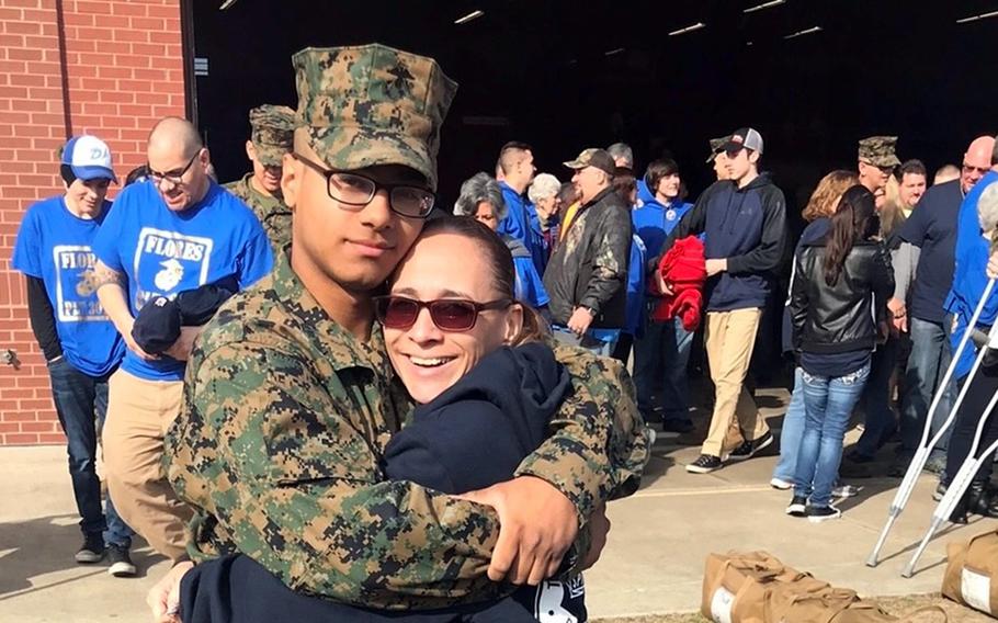 Marine Pfc. Ronald Valentin, seen here embracing his mother, Gloria Ortiz, died under mysterious circumstances after going missing at Camp Hansen, Okinawa, Aug. 31, 2018. 
