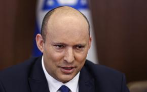 Israeli Prime Minister Naftali Bennett chairs a cabinet meeting at the prime minister's office in Jerusalem, Sunday, June 26, 2022. (Ronen Zvulun/Pool via AP)