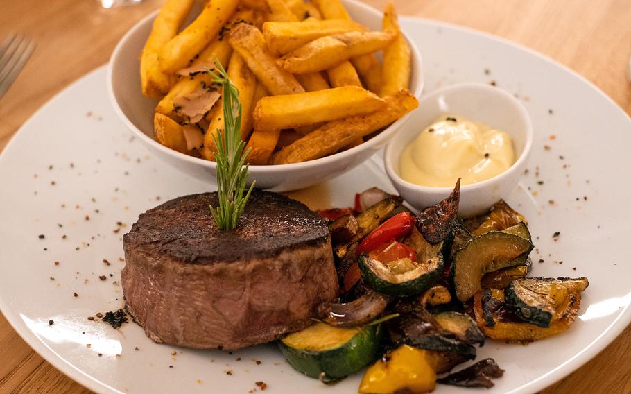 The fillet of gold beef with truffle fries and grilled vegetables at the Steaklounge in Weiden, Germany, Aug. 16, 2022. 