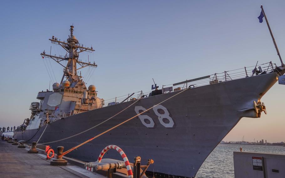 Guided-missile destroyer USS The Sullivans pulls into Manama, Bahrain, on Nov. 20, 2022. The Sullivans is deployed to the U.S. 5th Fleet area of operations to help ensure maritime security and stability in the Middle East region. 