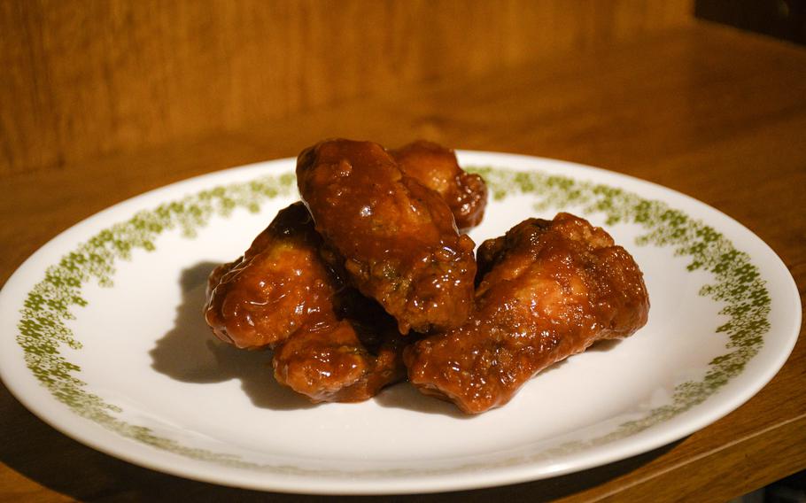 Fried chicken wings are paired with dozens of sauces at Ishan’s Gourmet Hot Wings in Kaiserslautern, Germany. 