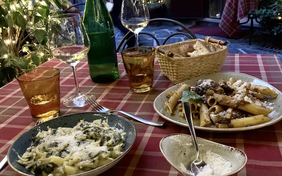 Buatta features hearty, traditional Neapolitan classics such as pasta with broccoli rabe and potato, left, and Genoese with broken ziti.