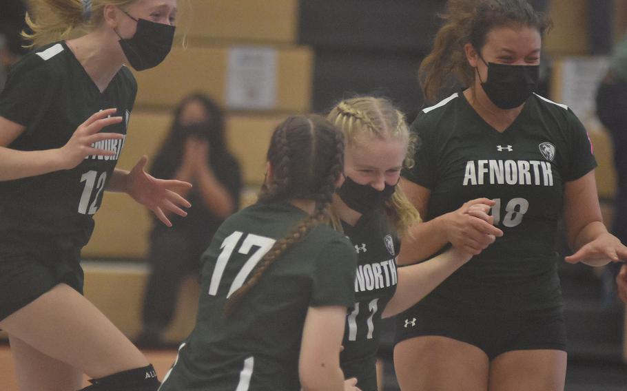 The AFNORTH Lions celebrate after winning the DODEA-Europe Division III volleyball tournament title on Saturday, Oct. 30, 2021 in Kaiserslautern, Germany. Volleyball was the only fall sport conducted indoors, but basketball, wrestling and marksmanship are all on the winter season schedule.