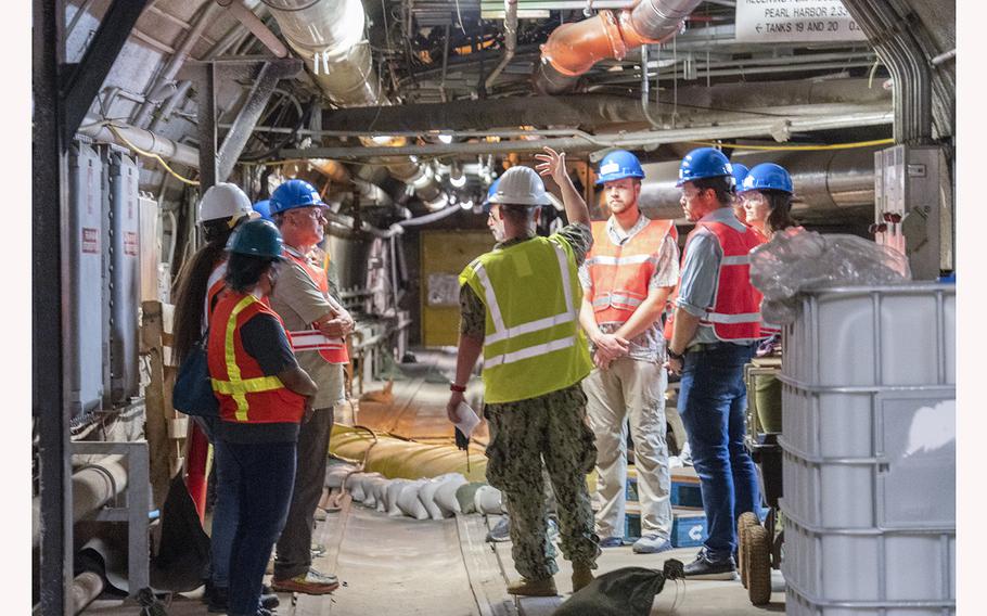 Navy Cmdr. Bill Jakubowicz, commander, Defense Logistics Agency Energy East Pacific, explains the layout of the Red Hill Bulk Fuel Storage Facility to U.S. Environmental Protection Agency and Hawaii Department of Health regulators during a site visit on Jan. 20, 2023. 