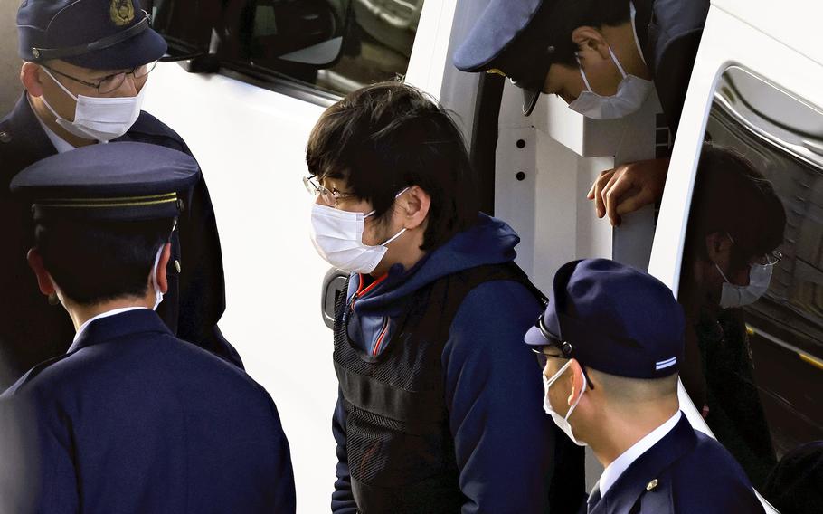Tetsuya Yamagami is transferred to the Nara Nishi Police Station in Nara following the end of his psychiatric evaluation on Tuesday.
