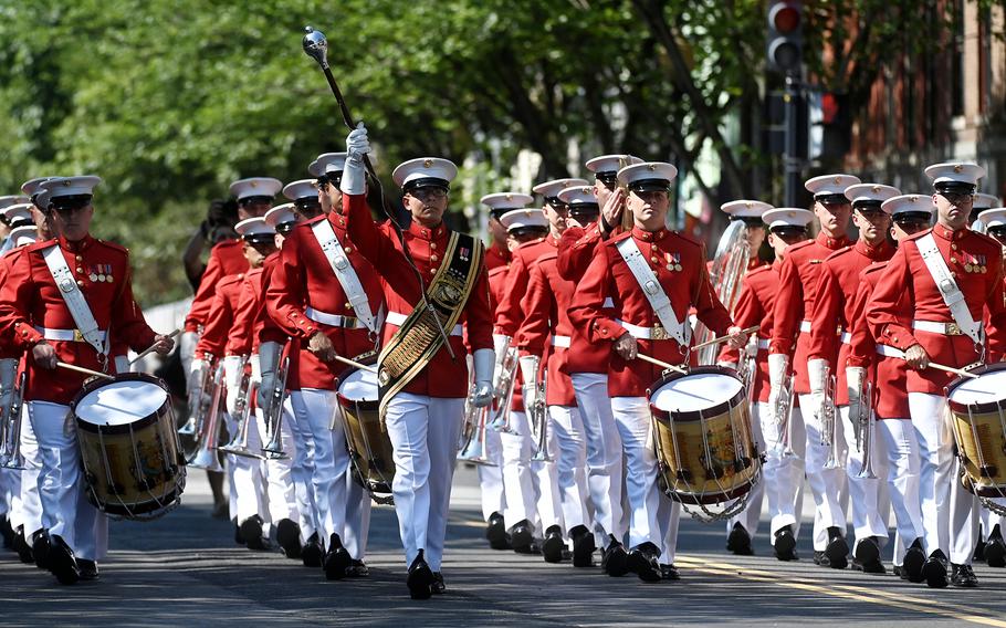 The United States Marine Drum and Bugle Corps marches as spectators enjoy the Barracks Row Parade celebrating Independence Day in Washington, D.C., on July 4, 2021.