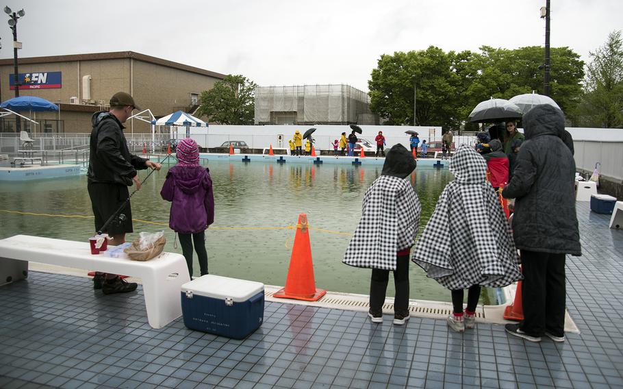 Anglers try their luck during the inaugural Sakana Trout Fishing Derby at Yokota Air Base, Japan, April 15, 2023.