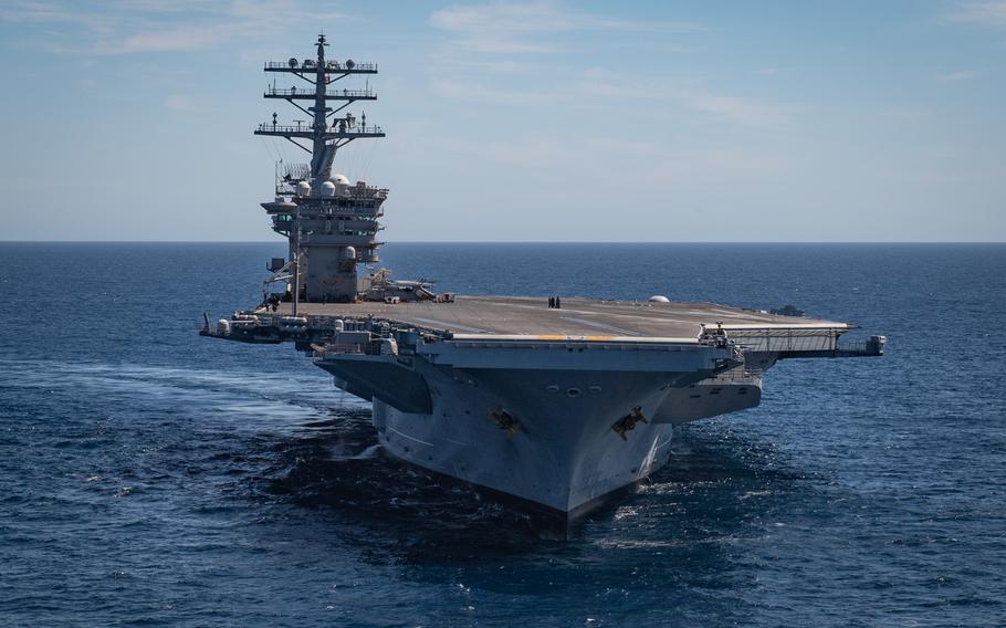 The aircraft carrier USS Nimitz underway in the Pacific Ocean, March 12, 2022. The Navy is monitoring five sailors who have reported health concerns potentially linked to jet fuel that tainted the drinking water supply aboard the aircraft carrier in September.