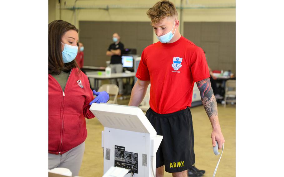 A soldier receives a bioelectrical impedance analysis scan at Fort Bragg, N.C., in October 2021. 