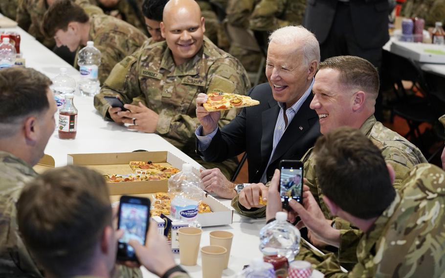President Joe Biden visits with members of the 82nd Airborne Division at the G2A Arena, Friday, March 25, 2022, in Jasionka, Poland. 
