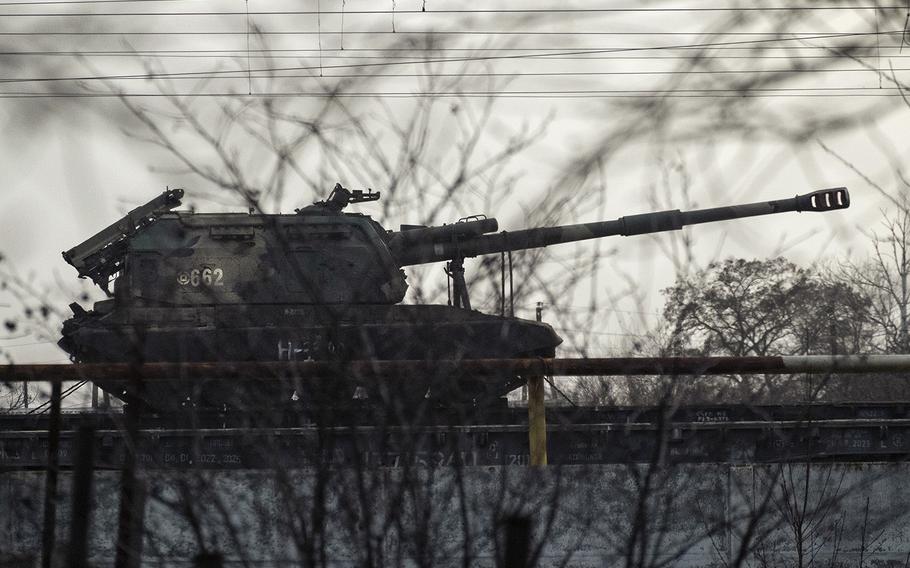 A Russian military column moves toward the border with Ukraine on Feb. 23, 2022. 