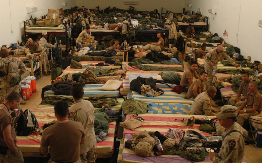 Manchus from 1st Battalion, 9th Infantry Regiment are living in a former morgue while they wait to move in to their barracks in Iraq.