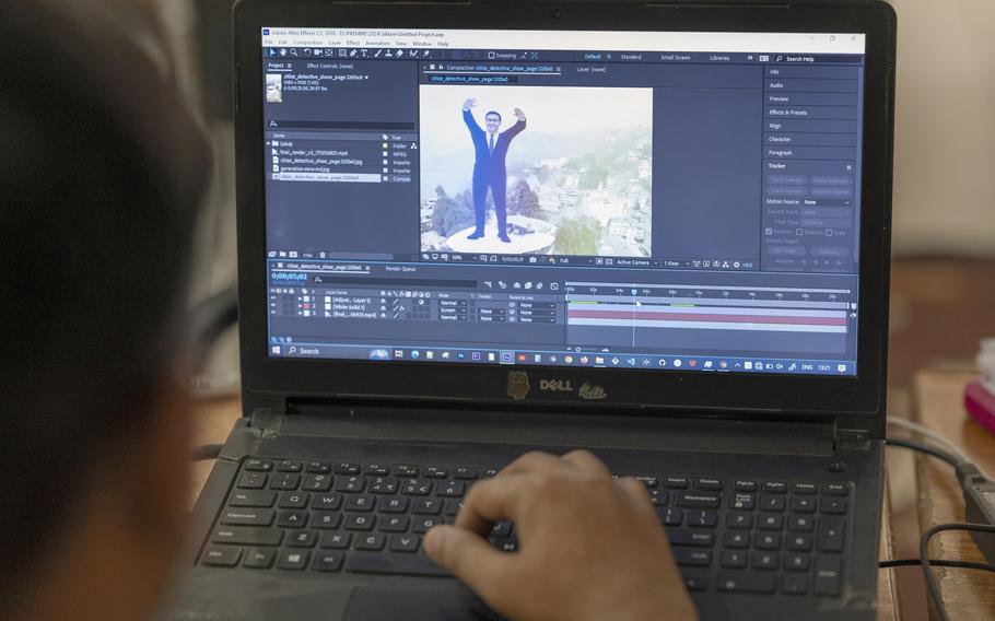 An employee works on a political-content project at the office of Polymath Solutions in Rajasthan, India, on April 16, 2024.