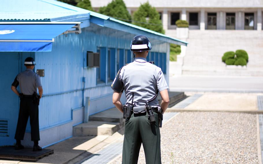 South Korean soldiers stand guard at the Korean Demilitarized Zone’s Joint Security Area in May 2017.