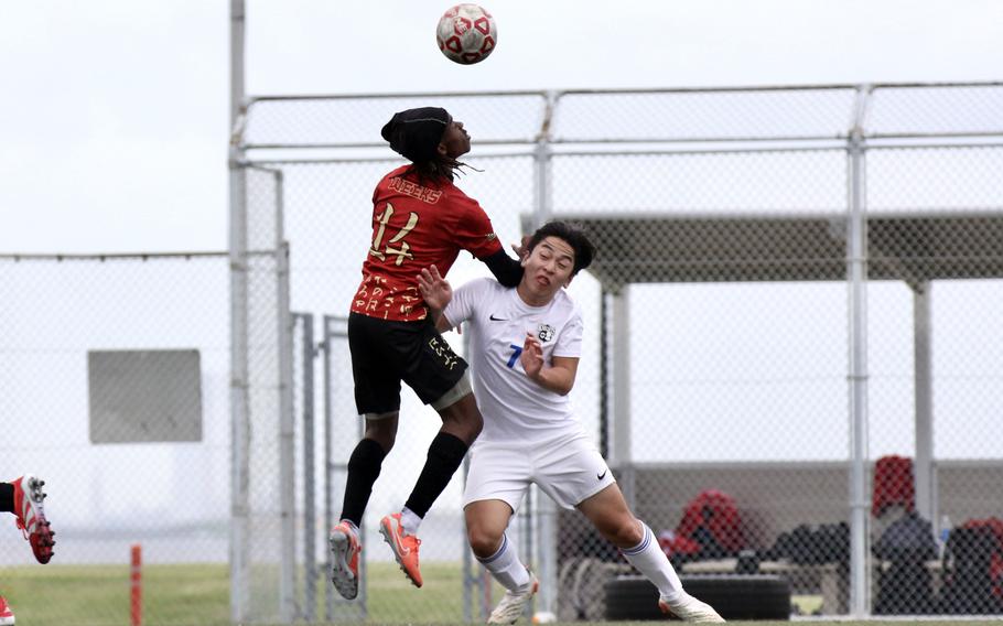 Mykhi Russell tries to head the ball.