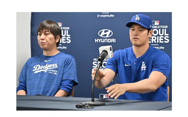 This picture taken on March 16, 2024, shows Los Angeles Dodgers' Shohei Ohtani (right) and his interpreter Ippei Mizuhara (left) attending a press conference at Gocheok Sky Dome in Seoul ahead of the 2024 MLB Seoul Series baseball game between Los Angeles Dodgers and San Diego Padres. The Los Angeles Dodgers said on March 21 they had fired Shohei Ohtani's interpreter after the Japanese baseball star's representatives claimed he had been the victim of "a massive theft" reported to involve millions of dollars. (Jung Yeon-je/AFP via Getty Images/TNS)
