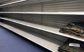 The shelves were mostly empty of camouflage uniforms at the exchange on Marine Corps Air Station Iwakuni, Japan, Wednesday, Oct. 4, 2023.