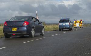 U.S. Air Force and local constabulary vehicles carry the 100th RAF Baton to RAF Croughton from RAF Barford St. John in 2018 during an anniversary event. U.K. officials have agreed to spend nearly $5 million to improve road safety near the two U.S. Air Force bases in England.