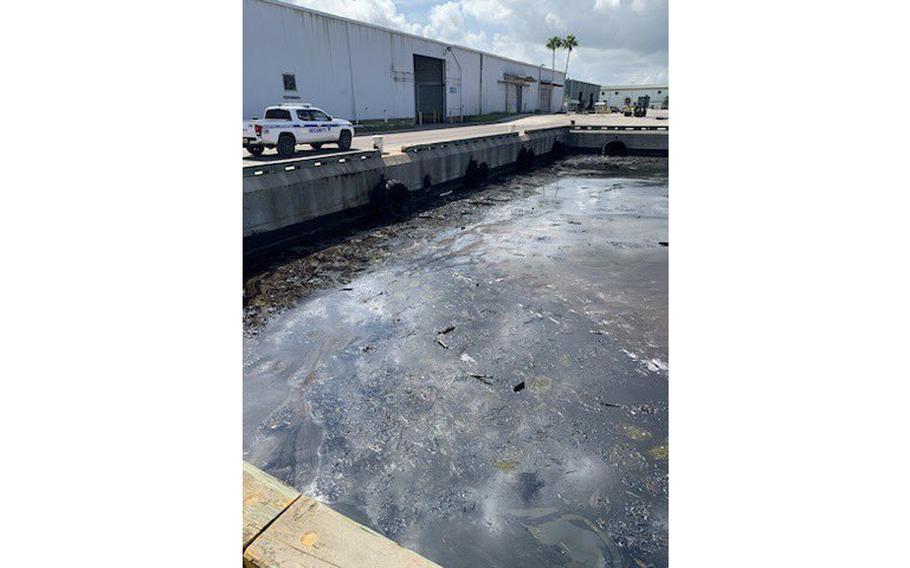 Crews contained the spill site with about 1,400 feet of boom and worked over the weekend to remove the oil-laced water from the port, the Coast Guard said. Cleanup efforts were ongoing Tuesday, Sept. 5, 2023.