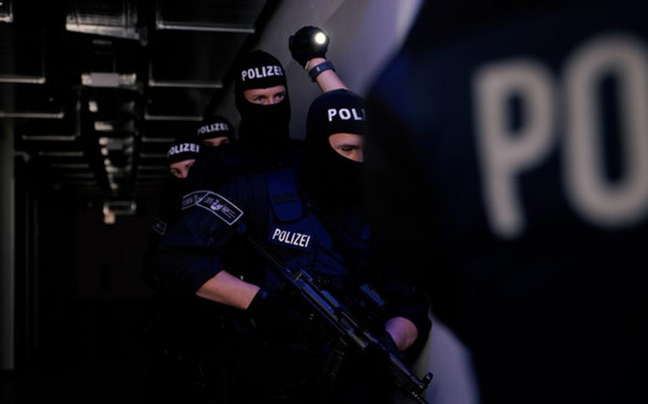 Officers of the Rheinland-Pfalz special police squads are shown training in an undated file photo. A suspected member of the Islamic State group was arrested near Speyer, Germany, on June 13, 2022, according to the federal prosecutor’s office.