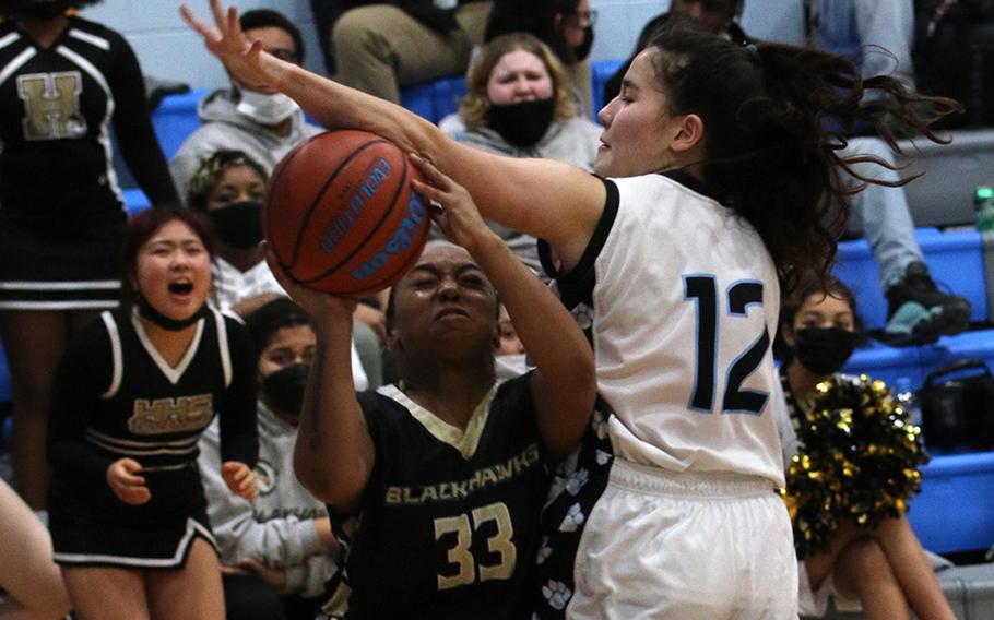 Humphreys Black’s Jaida Brinkerhoff has her shot blocked by Osan’s Hanna Rutland.