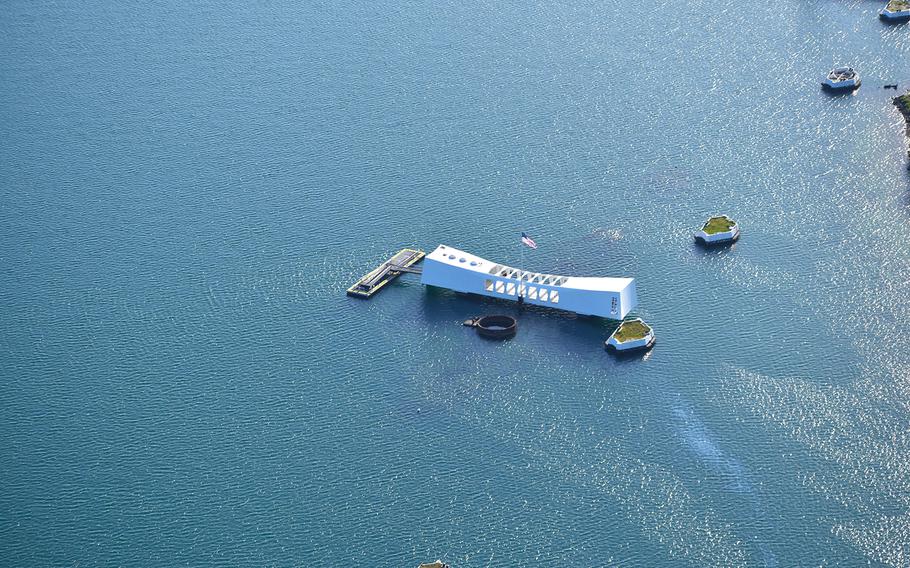 A bird’s-eye view of the USS Arizona in Pearl Harbor, as seen from a helicopter tour of Oahu. A tour of the stirring memorial is a must-do for anyone visiting Oahu. 