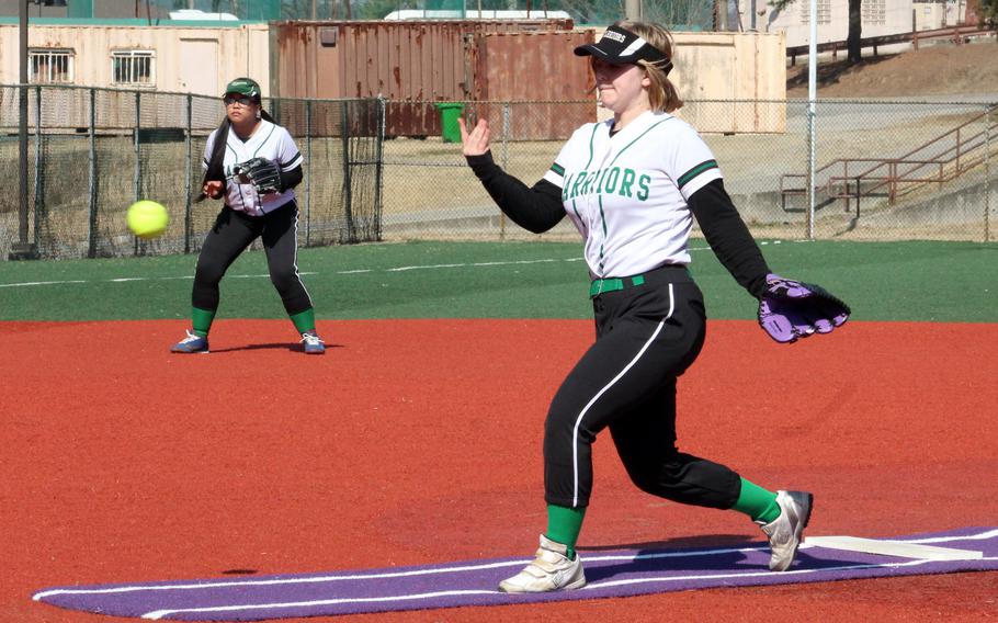 Daegu right-hander Elizabeth Benjamin delivers against Osan American during Saturday's Korea softball game. The Cougars won 16-0.