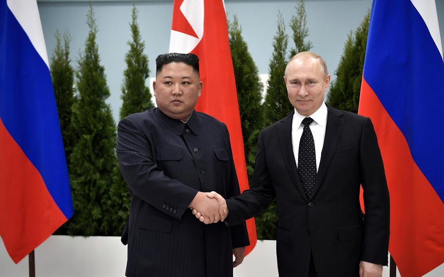 North Korean leader Kim Jong Un shakes hands with Russian President Vladimir Putin in Vladivostok during a visit on April 25, 2019.