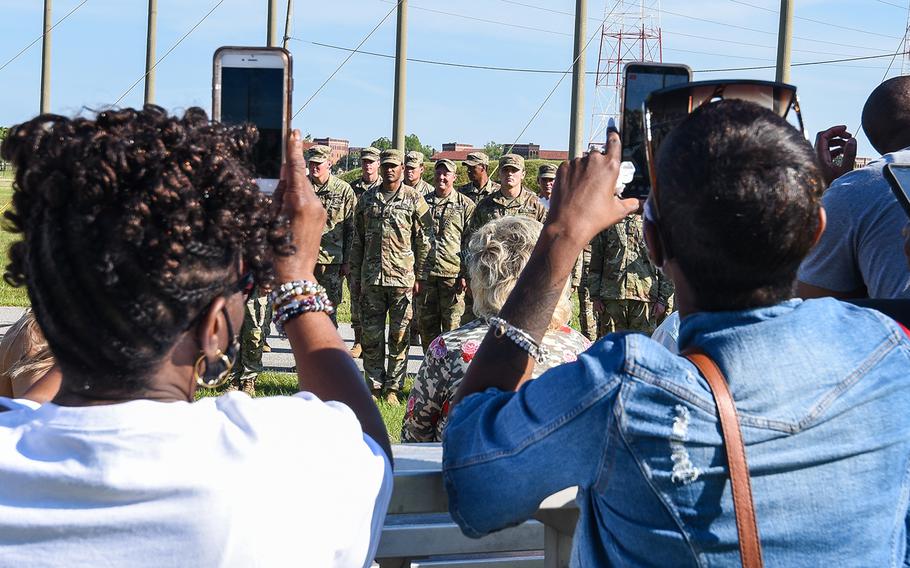 Family members watch their soldiers graduate from the Army’s Basic Airborne Course at Fort Benning, Ga. on Friday, May 21, 2021. It marked the first airborne school graduation open to family and loved ones since the beginning of the coronavirus pandemic. 