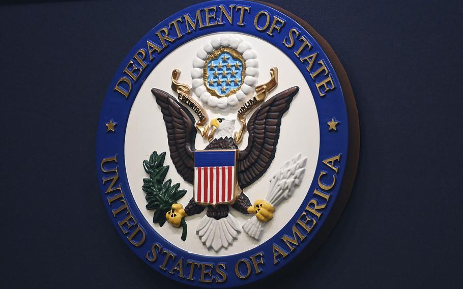 The State Department seal is seen on the briefing room lectern at the State Department in Washington, Jan. 31, 2022. 