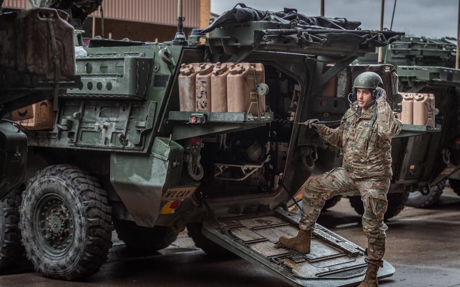 A soldier assigned to 3rd Squadron, 2nd Cavalry Regiment, conducts communication checks before deploying on a tactical road march at Rose Barracks in Vilseck, Germany, Feb. 20, 2022. Under the command and control of V Corps in Europe, the regiment conducted a winter tactical road march over 900 miles from Germany to Latvia with NATO allies and partners. 