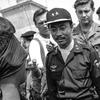 Robert Kersey/Stars and Stripes
Gio Linh, South Vietnam, March, 1967: South Vietnamese Premier Nguyen Cao Ky talks with a blindfolded North Vietnamese prisoner during a visit to an outpost a mile south of the demilitarized zone. Behind Ky is Bill Plante of CBS News. On his way to the camp, Ky criticized American efforts to stop the war, telling reporters the North and South Vietnamese should negotiate alone, without outsiders, "when the time is right."
