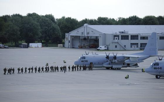Marines from the 1st Battalion 24th Marines prepare to depart their home station of Selfridge Air National Guard Base, Mich., on Aug. 4, 2015. The Marines participated in a training exercise at the USMC Mountain Warfare Training Center in southern California. Nearly 300 Marines departed Selfridge for the training, moving on six USMC C-130 Hercules tactical airlift aircraft. The Michigan Air National Guard’s Small Air Terminal flight at Selfridge helped to facilitate the move, loading 10 pallets of equipment for transport on the C-130s for the Marines. Many Michigan-based military units utilize the capabilities of the Small Air Terminal facility at Selfridge to facilitate major troop and equipment movement. (U.S. Air National Guard photo by Master Sgt. David Kujawa / Released)