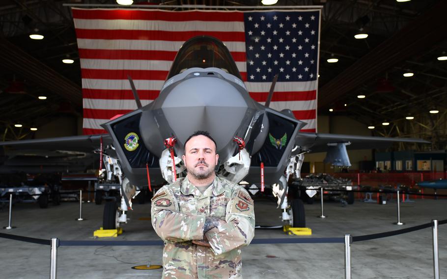 Tech. Sgt. Matthew Byous stands in front of a F-35A Lightning II at the 48th Equipment Maintenance Squadron at RAF Lakenheath, England, March 24, 2022. Byous, a third-generation airman, has been part of a working group seeking ways to help commanders and subordinates better communicate.  