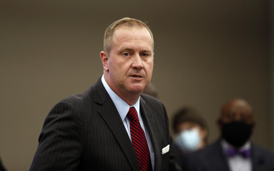 Missouri Attorney General Eric Schmitt speaks during a news conference in St. Louis on Aug. 6, 2020. A federal judge has blocked President Joe Biden's administration from enforcing a coronavirus vaccine mandate on health care workers in 10 states. 