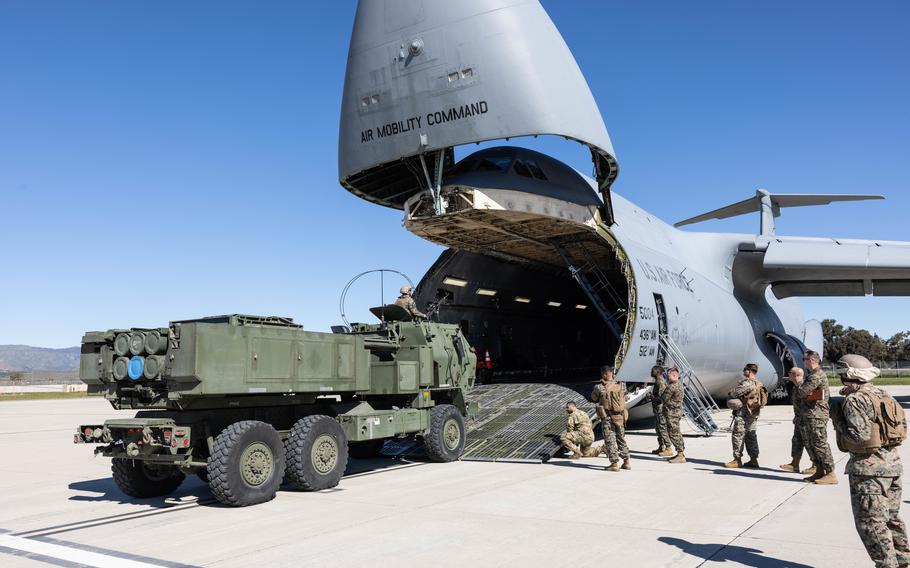 Marines with 5th Battalion, 11th Marine Regiment, 1st Marine Division, drive an M142 High Mobility Artillery Rocket System onto a U.S. Air Force C-5 Galaxy during a loading exercise at Marine Corps Air Station Camp Pendleton, Calif., Feb. 7, 2023. Poland has requested to buy up to $10 billion worth of HIMARS launchers and equipment.