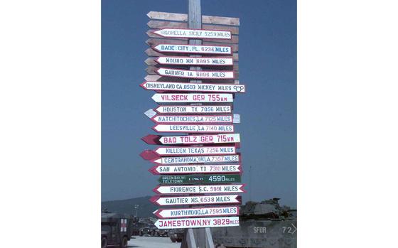Camp Bedrock, Bosnia and Herzegovina, Sept. 2, 1997:  A road sign tree shows directions and distances to the hometowns and home bases of the troops stationed at Camp Bedrock. Originally occupied by engineers, they saw one of the cranes used by the mining operation at the edge of the camp and somebody noted it looked just like the one used by Fred Flinstone in the old popular cartoon series. The engineers have left, but the name stuck. 

Looking for Stars and Stripes’ historic coverage? Subscribe to Stars and Stripes’ historic newspaper archive! We have digitized our 1948-1999 European and Pacific editions, as well as several of our WWII editions and made them available online through https://starsandstripes.newspaperarchive.com/

META TAGS: Bosnia and Herzegovina; Yugoslav war; peacekeeping; IFOR; 