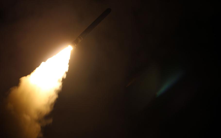 The guided-missile destroyer USS Laboon fires a Tomahawk land-attack missile at a target in Syria, April 14, 2018. 