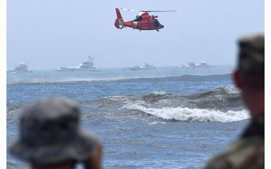 Spectators watch the US Coast Guard during the 2023 Visit Atlantic City Airshow on Wednesday, August 16, 2023.